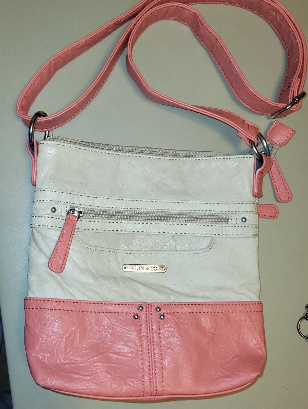 Stone Mountain Accessories Coral and Cream Leather Crossbody Purse.